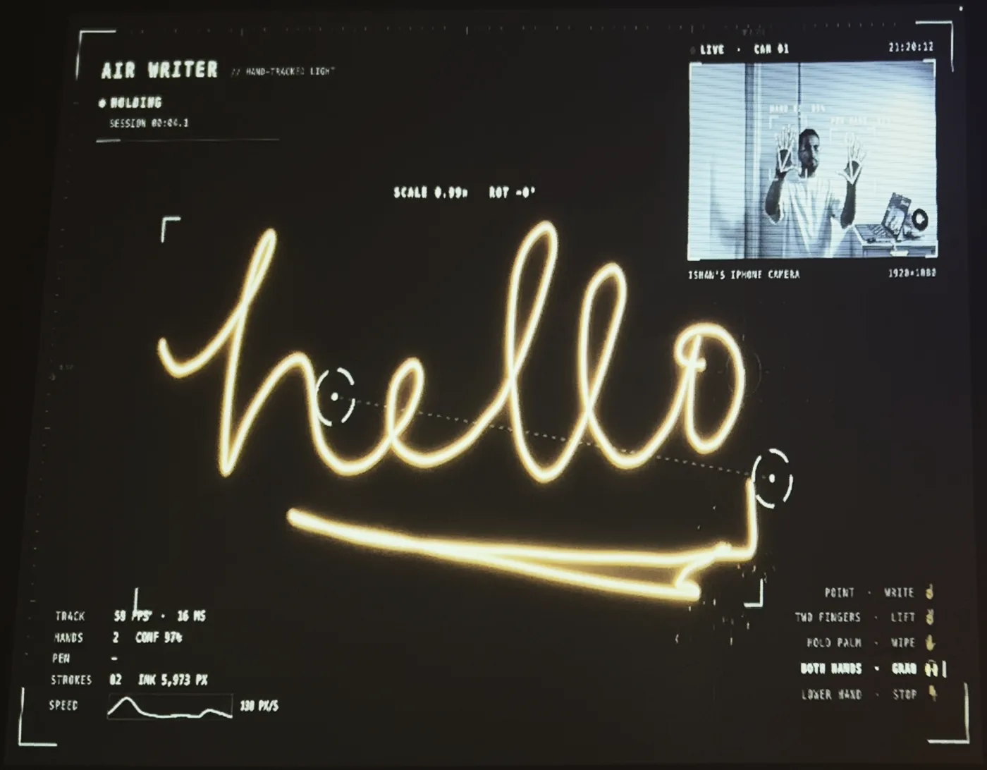 Grabbing the writing with both hands: brackets frame it and the display shows its scale and rotation