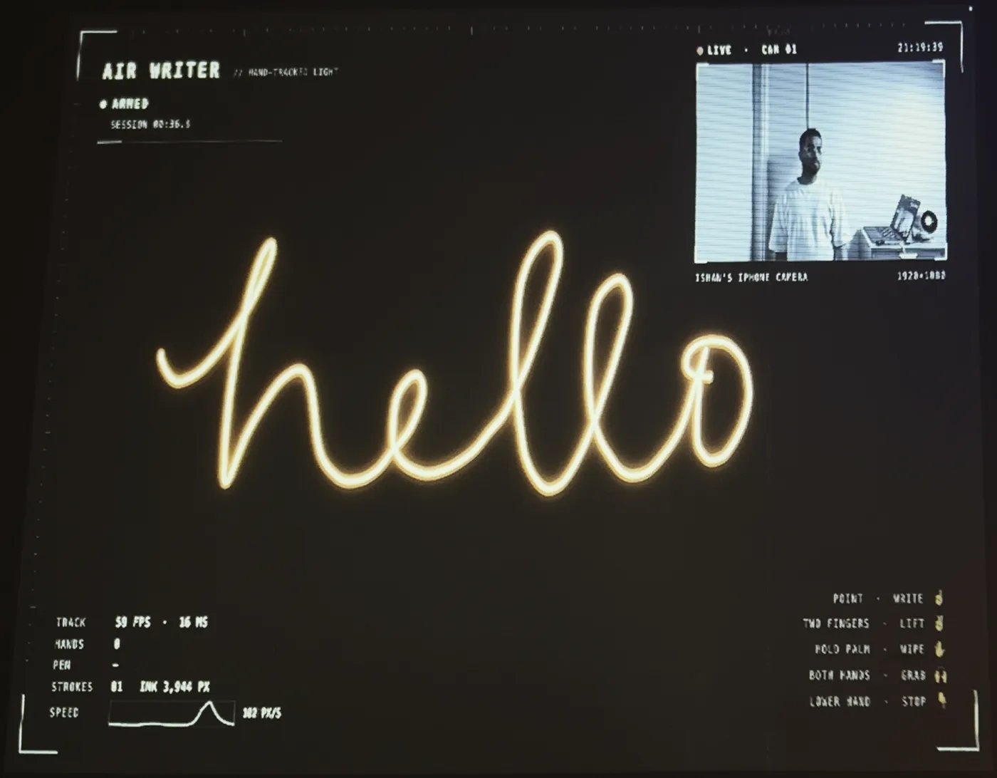 My wall after writing hello in the air with my finger, with the heads-up display around it